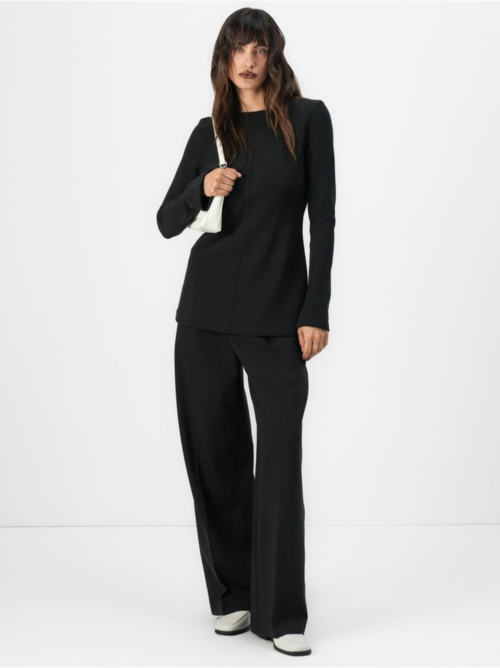 Calvin Klein Tailored Knit Slim Tunic Top in black, size small. New with tags.
